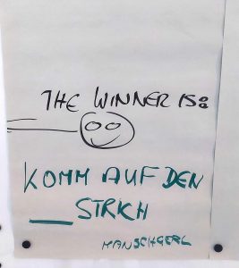 Flipchartseite mit folgendem Text: The winner is: Komm auf den Strich!